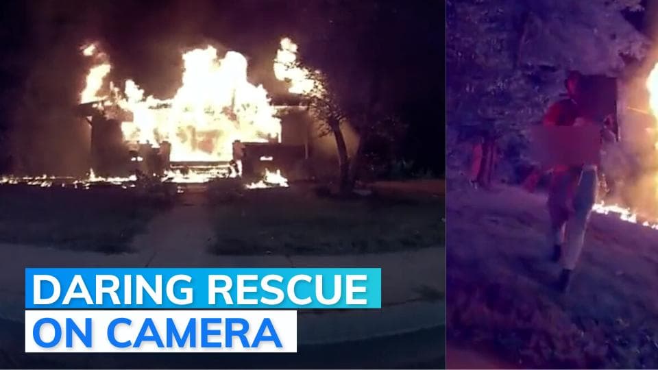 Video: man rushes in to burning house, saves four children