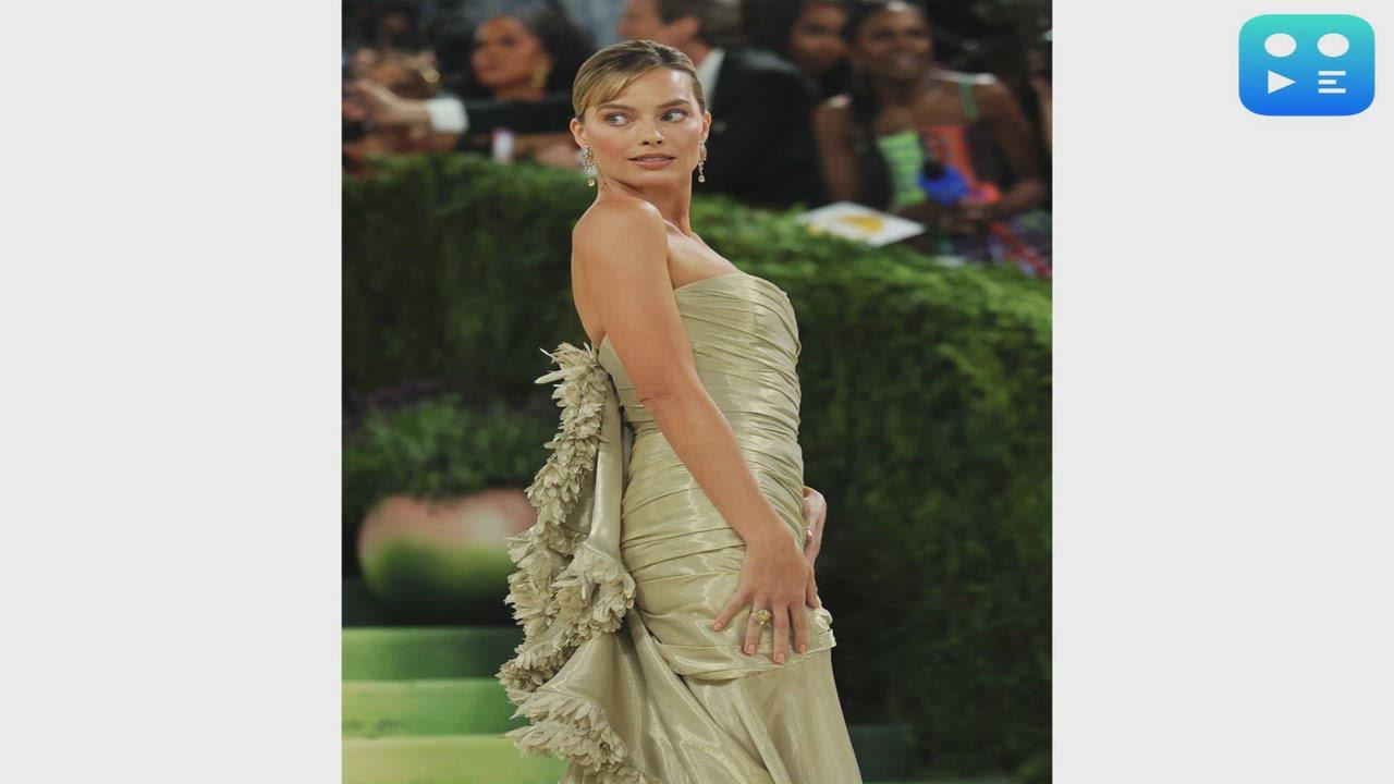 Margot Robbie returns to Met Gala in intricately embroidered gold Chanel gown