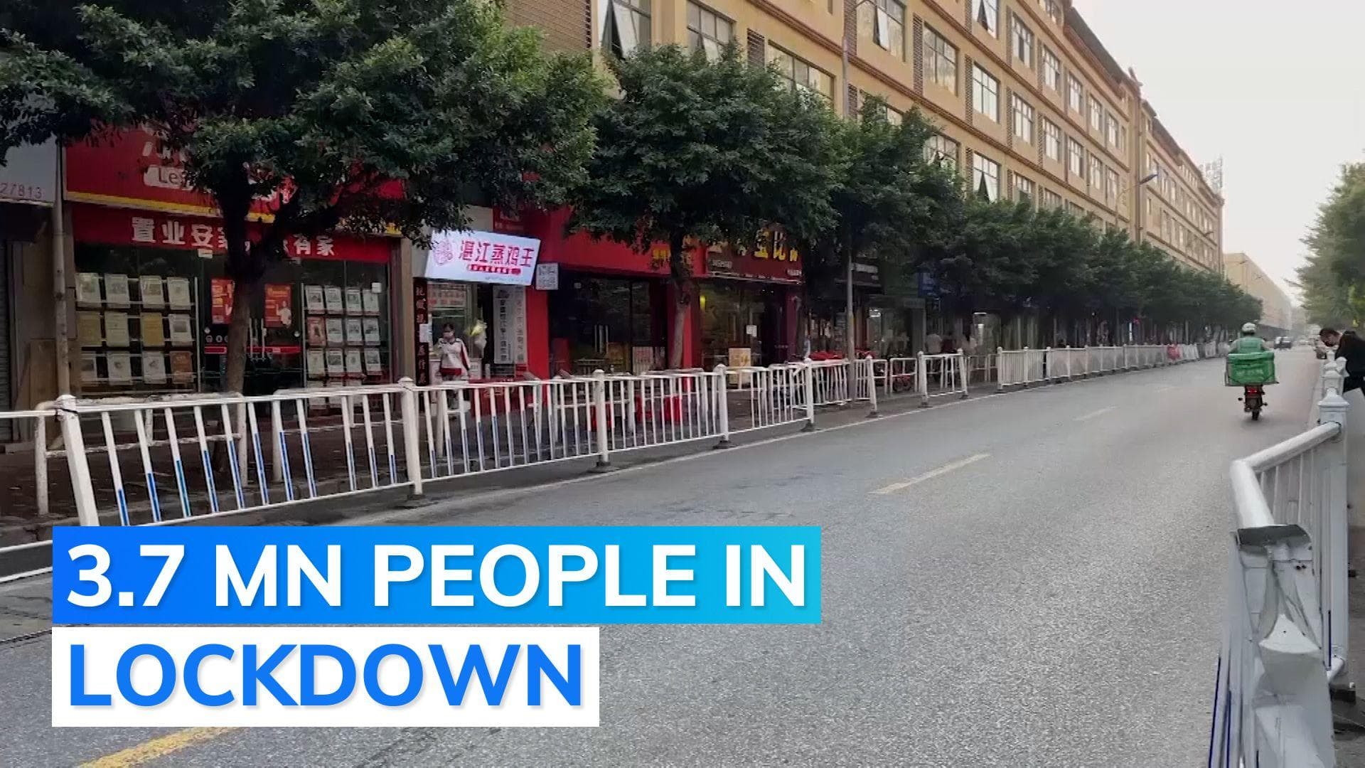 China locks down Guangzhou in Covid-19 crackdown