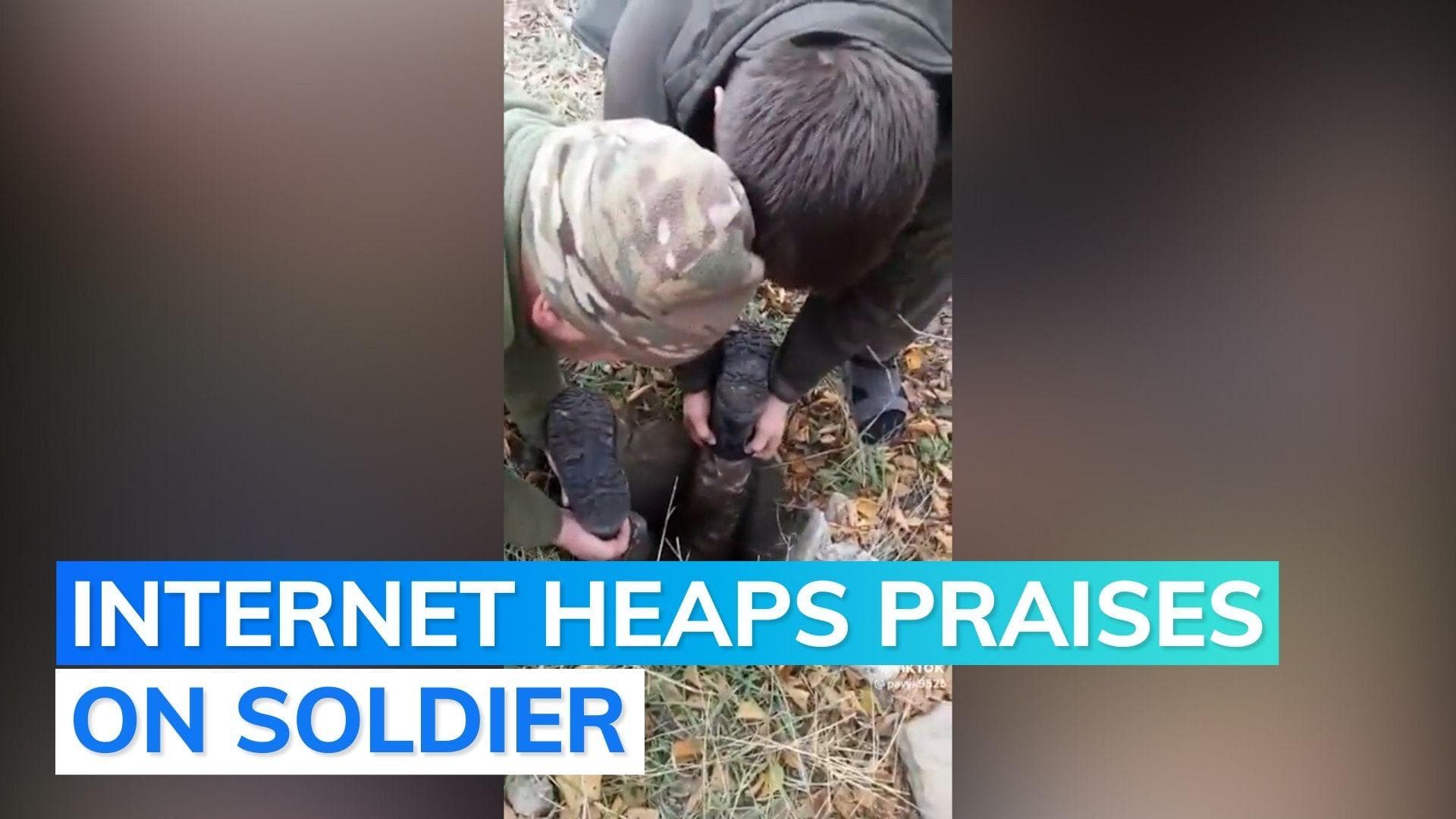 Watch: Ukrainian soldier turns upside down to rescue puppy