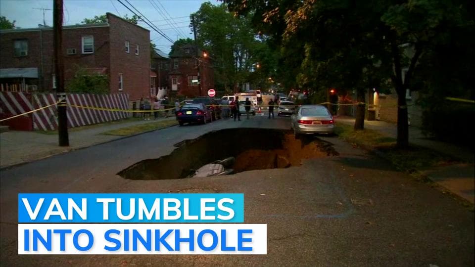Video: Van tumbles into sinkhole amid rains in New York