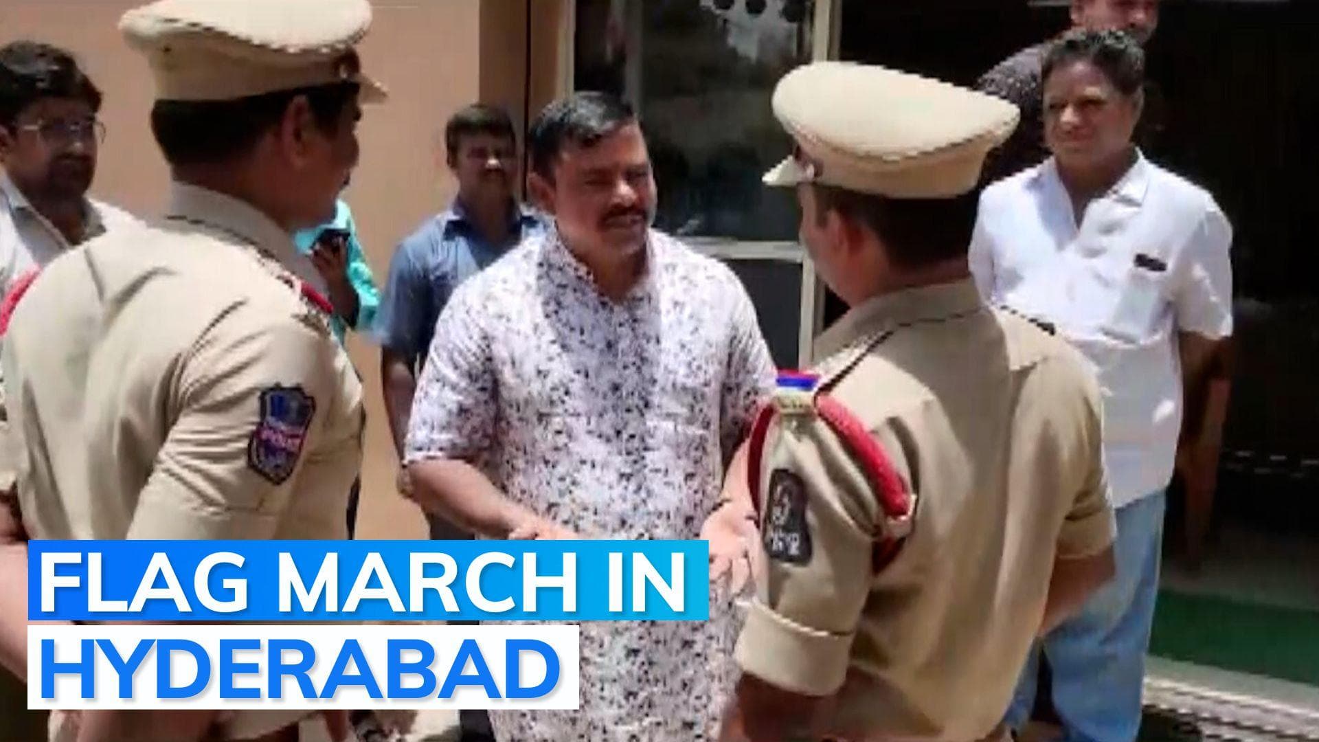 Security personnel carry out flag march in Hyderabad as people protest against T Raja Singh