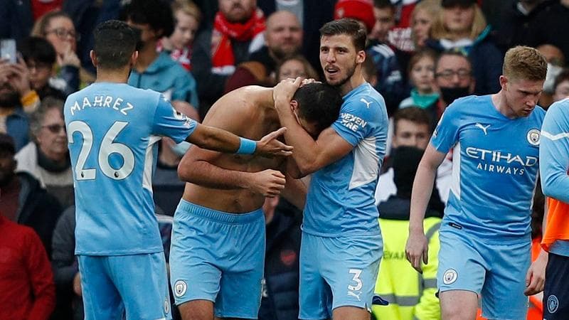 Premier League: stoppage-time winner gives Manchester City a dramatic 2-1 win over Arsenal
