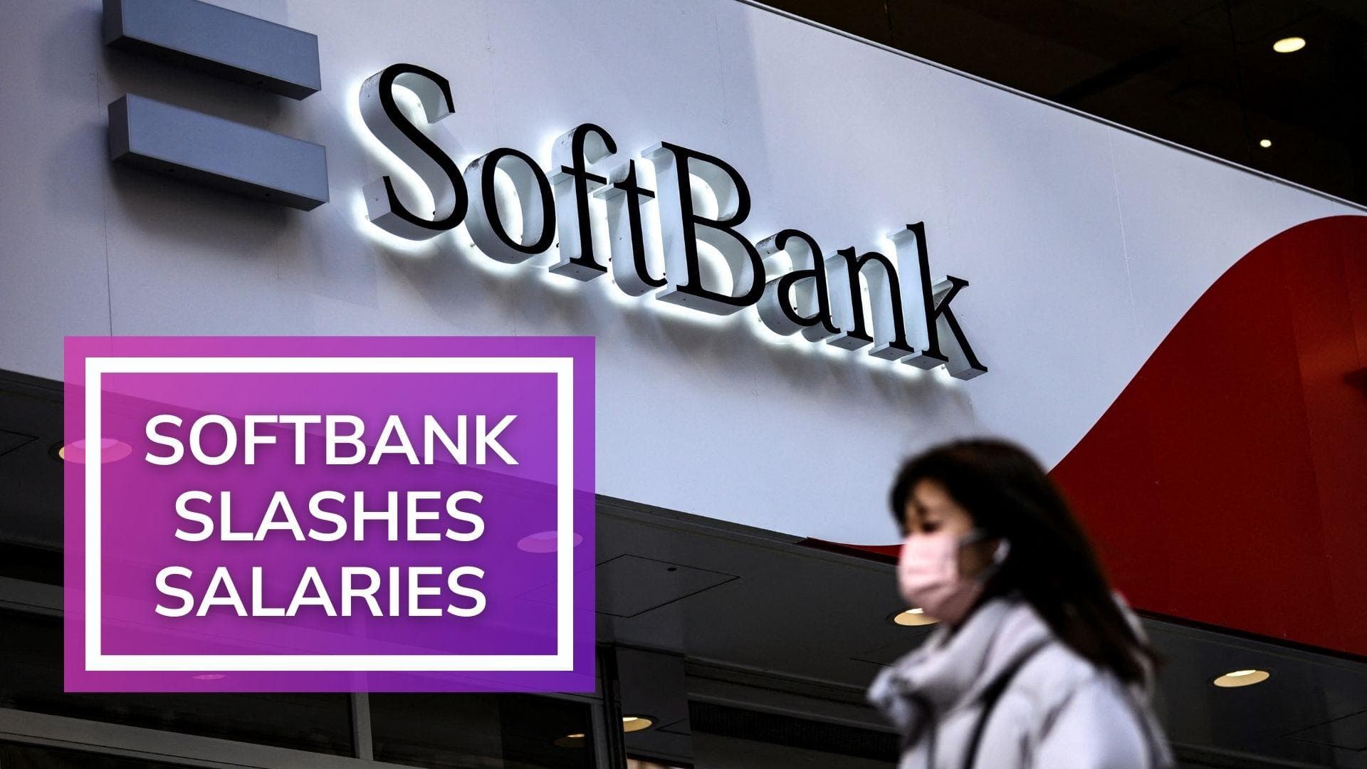 SoftBank slashes pay after historic loss at fund