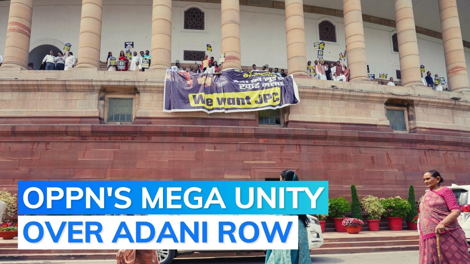 Watch: Opposition holds protest over Adani issue at corridors of Parliament building