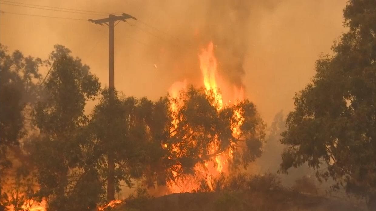 California wildfires continue to blaze, threaten homes