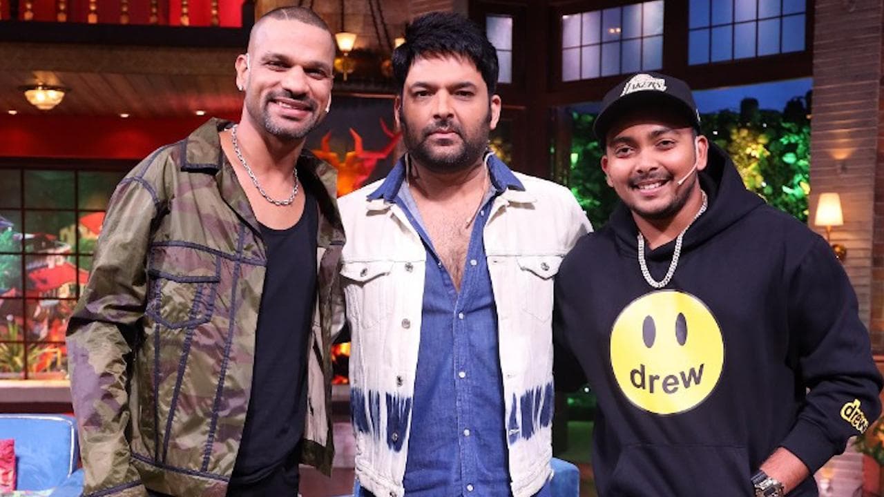 Kapil Sharma के शो में शिखर धवन और पृथ्वी शॉ लगाएंगे हंसी के ‘चौके-छक्के’, मशहूर कवि बांधेंगे शो में समा