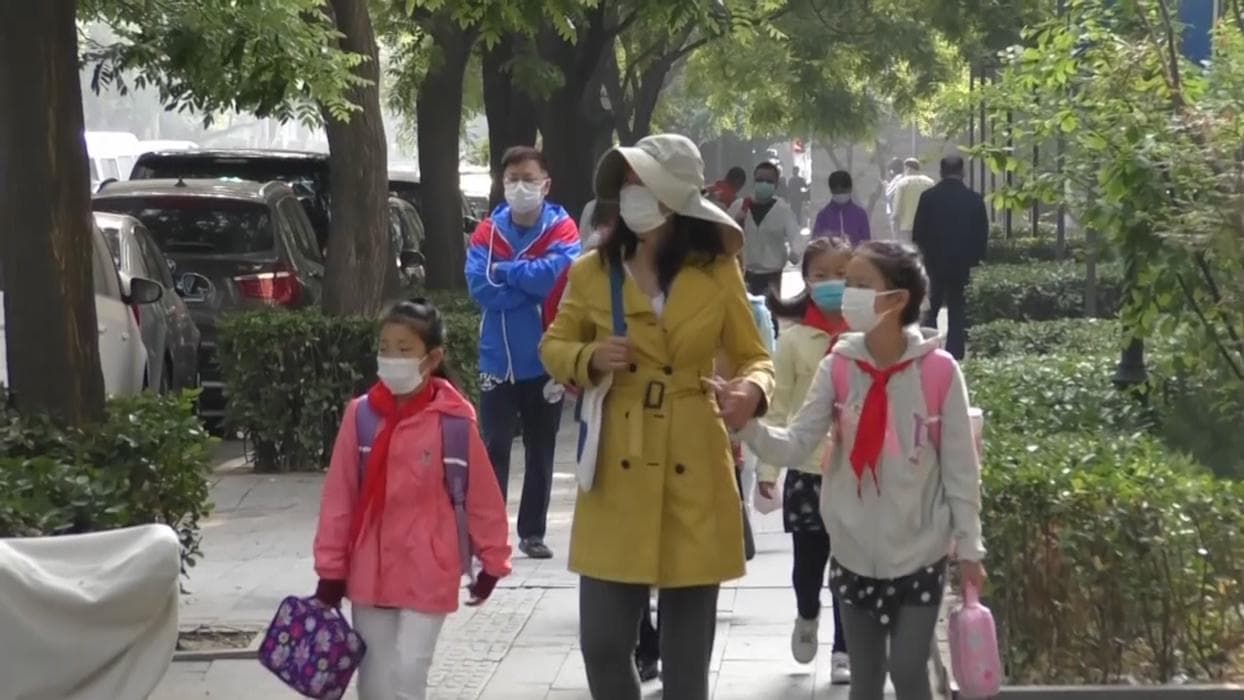 China relaxes family planning rules, allows couples to have 3 children