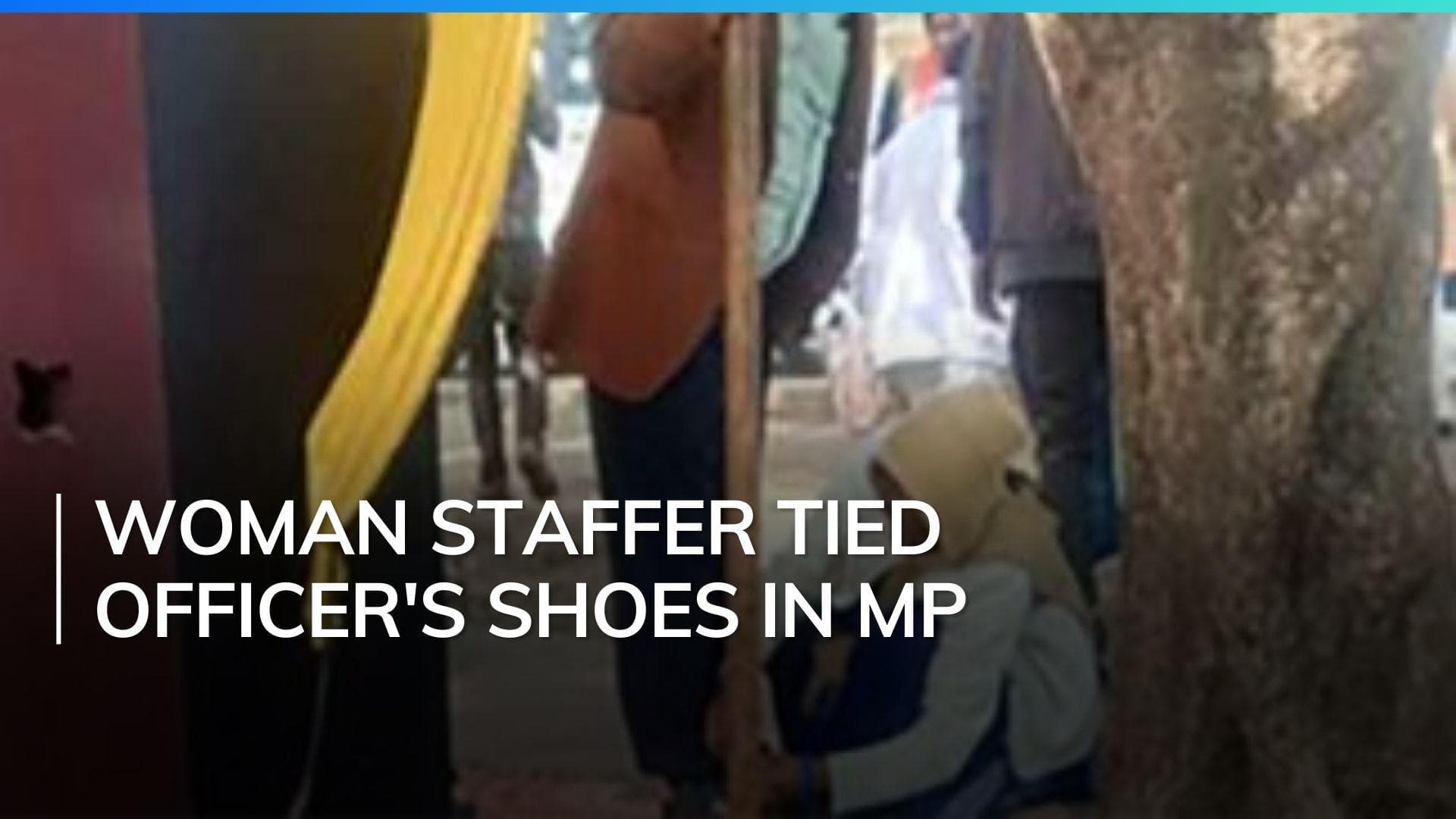 MP: senior officer transferred after photo shows woman tying his shoes