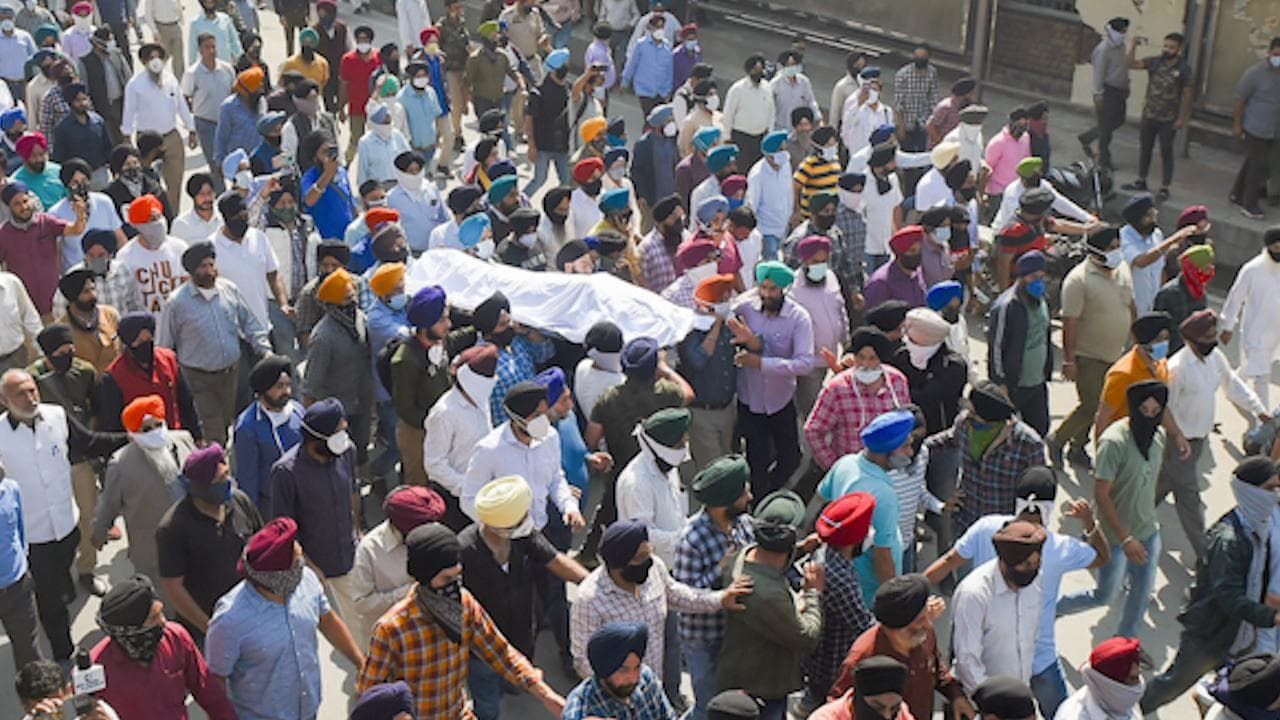 Sikhs protest in Srinagar against killing of a school principal and teacher