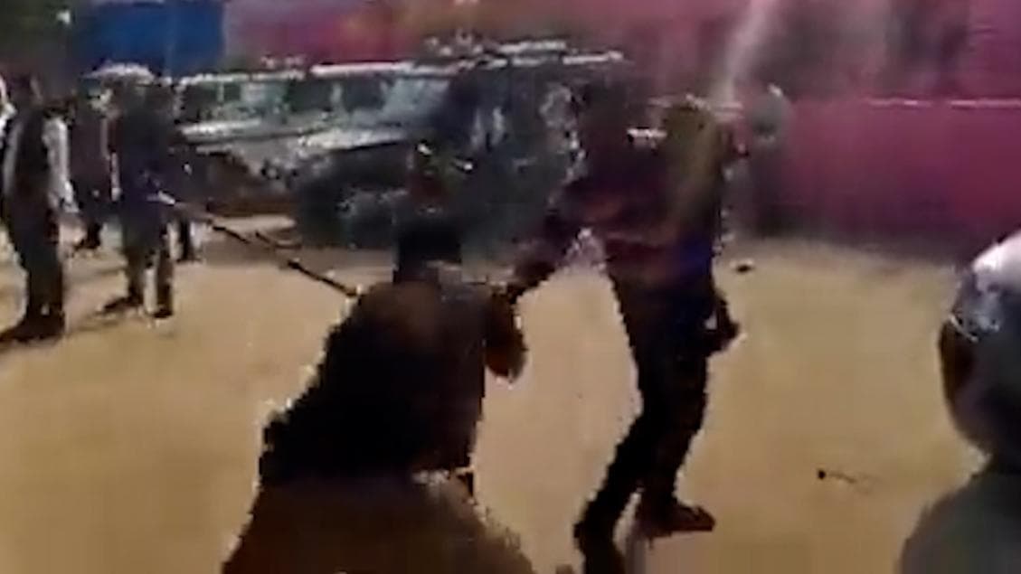 On video: UP cops rain lathis on a man with child in arms, later claim 'light force'