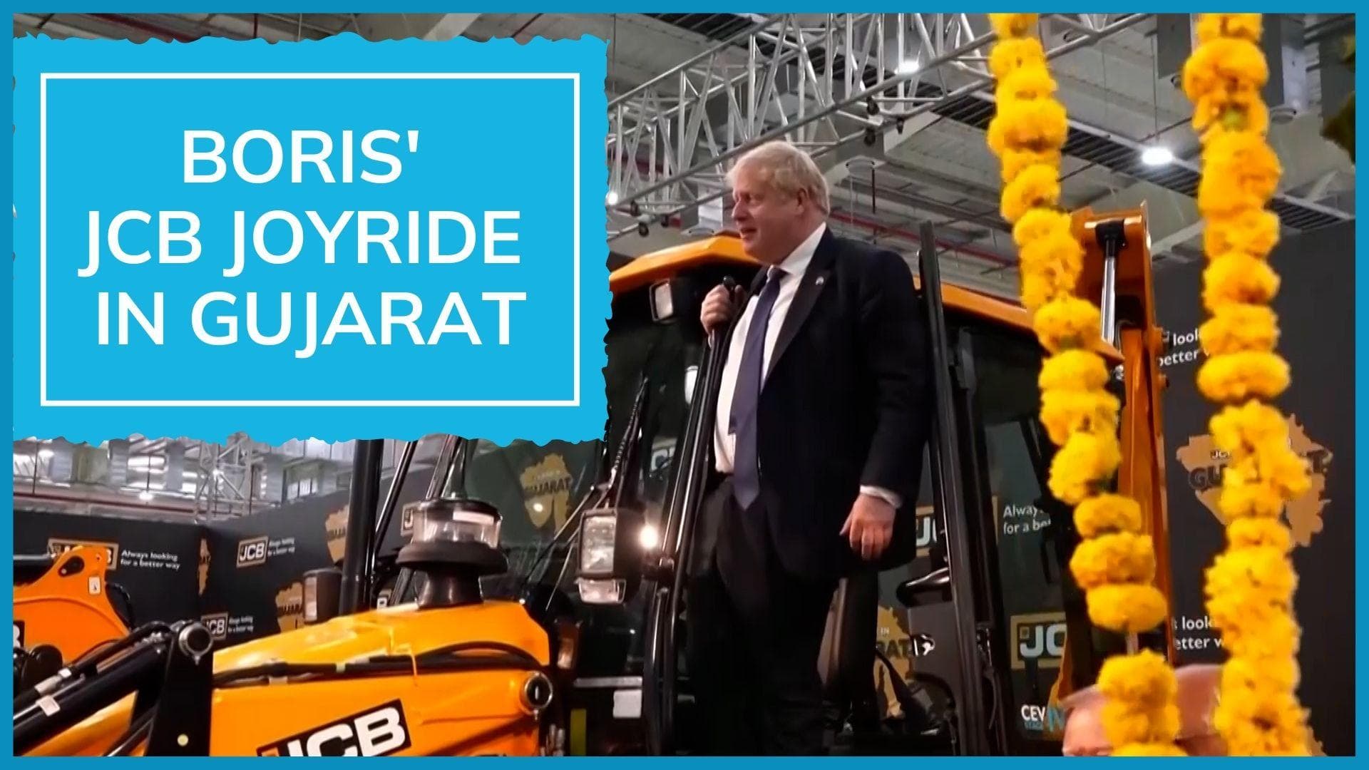 Watch: UK PM Boris Johnson climbs JCB machine at Gujarat factory