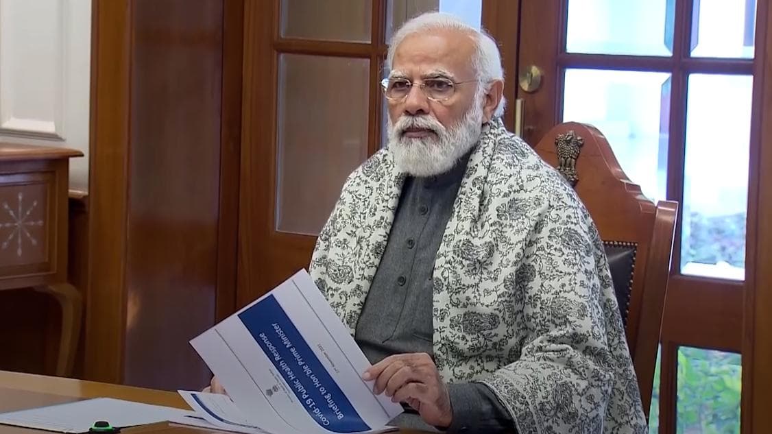 Omicron variant: PM Modi discusses travel curbs as world races to fight new Covid-19 strain 