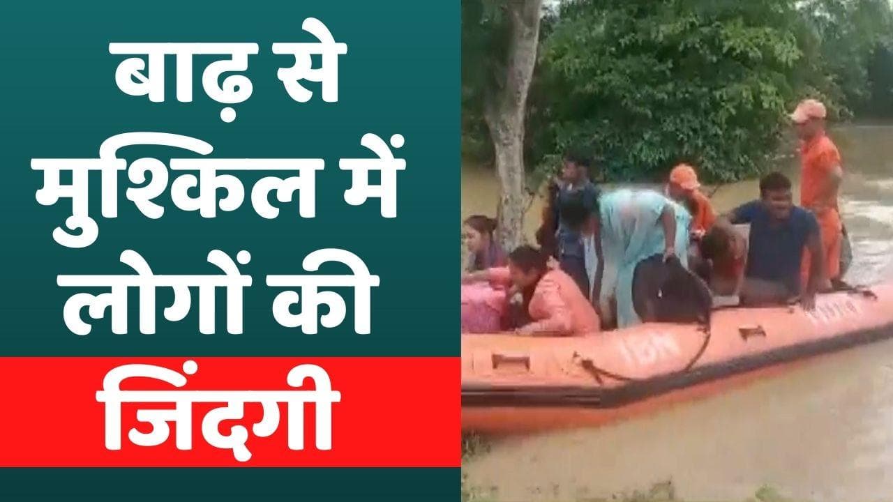 Assam बाढ़ में फंसी लाखों जिंदगी, तस्वीरें बयान कर रही है मंजर