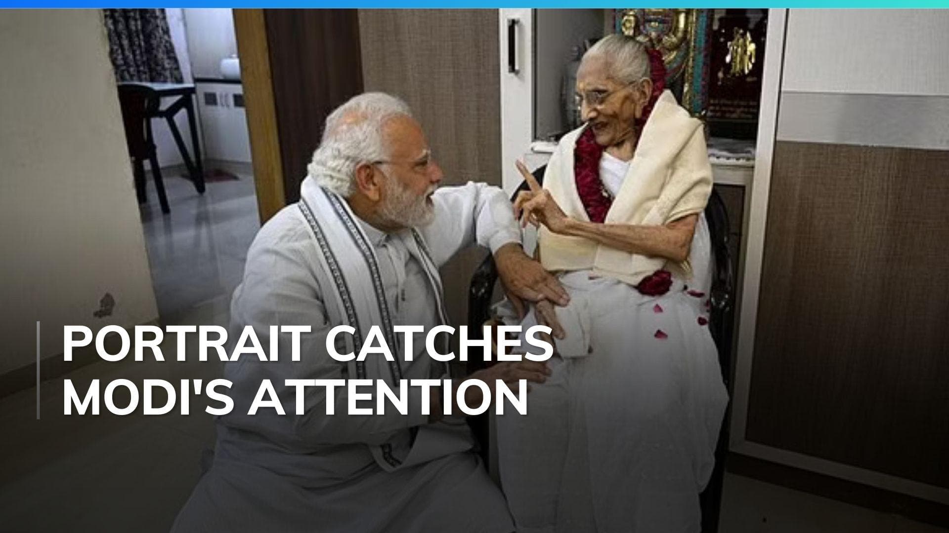 In video, PM Modi stops speech midway to praise his mother's portrait