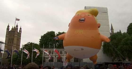 The angry, pouting baby Trump blimp is back!