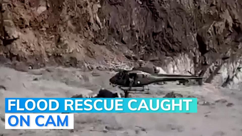 Pakistan floods: Man rescued from a raging river by military helicopter