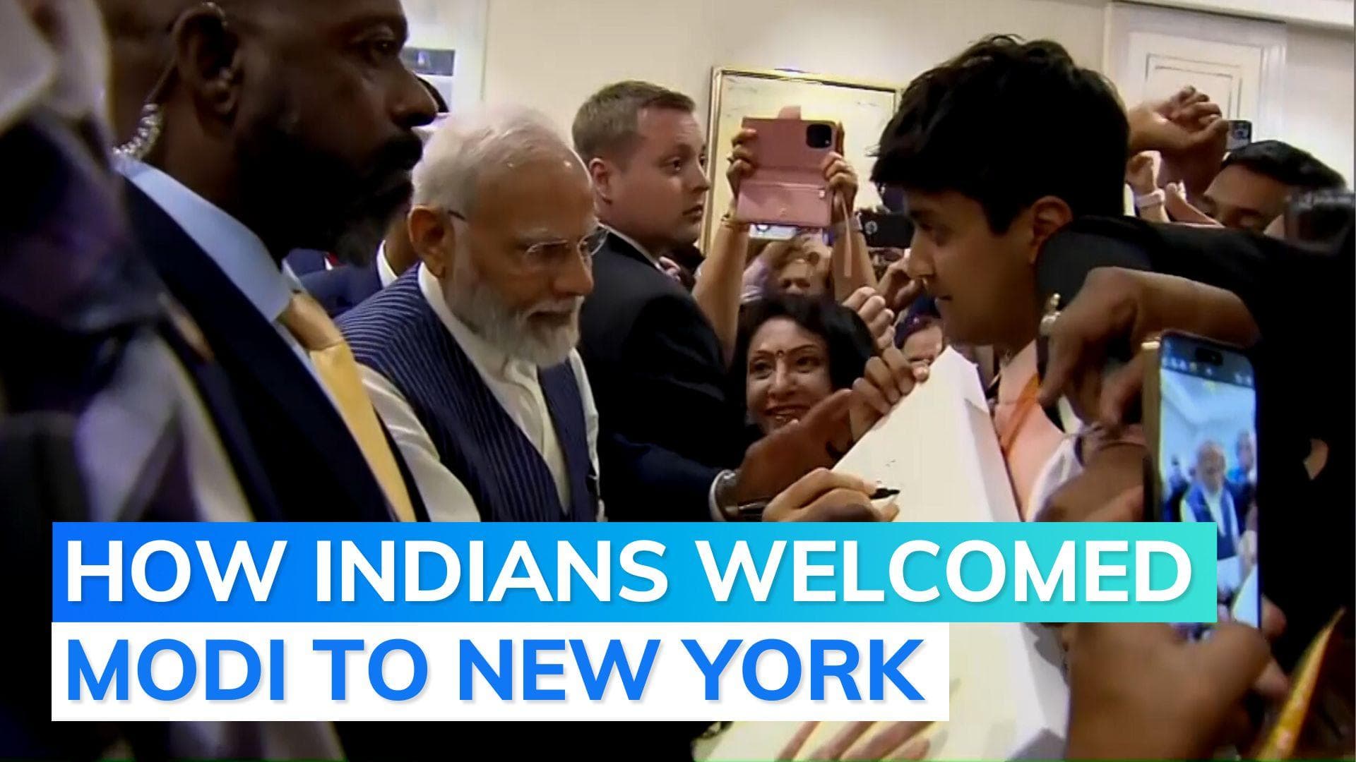 Indians welcome PM in New York: this man's jacket has Modi's face printed on it