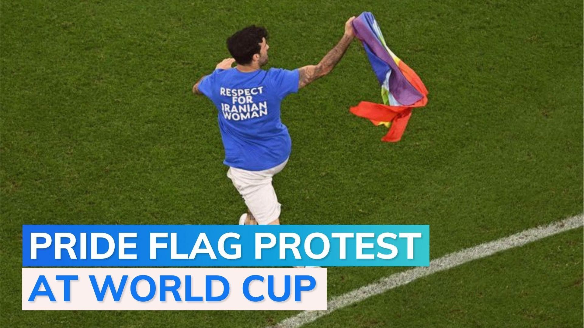 FIFA World Cup 2022: spectator with rainbow flag runs onto field, interrupts Portugal-Uruguay match