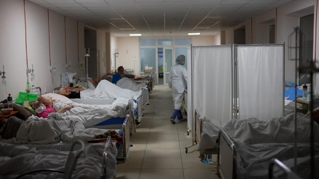 Ukraine struggles to fight Covid-19 with low vaccination rates & overburdened hospitals