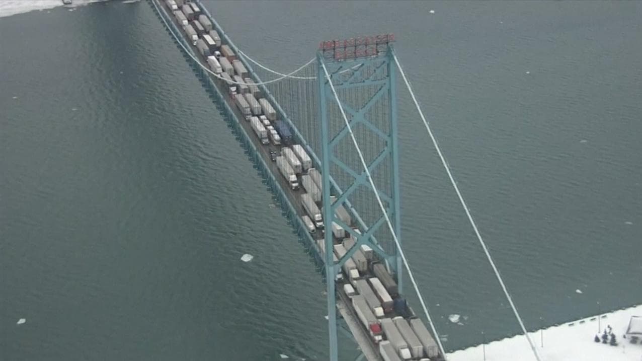 Canada truck protest leads to halted traffic on key US trade bridge 
