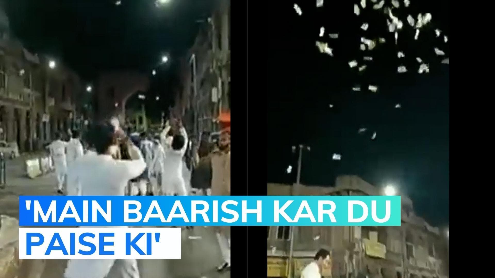 Watch: it's raining cash in Hyderbad! Man seen throwing cash in the air