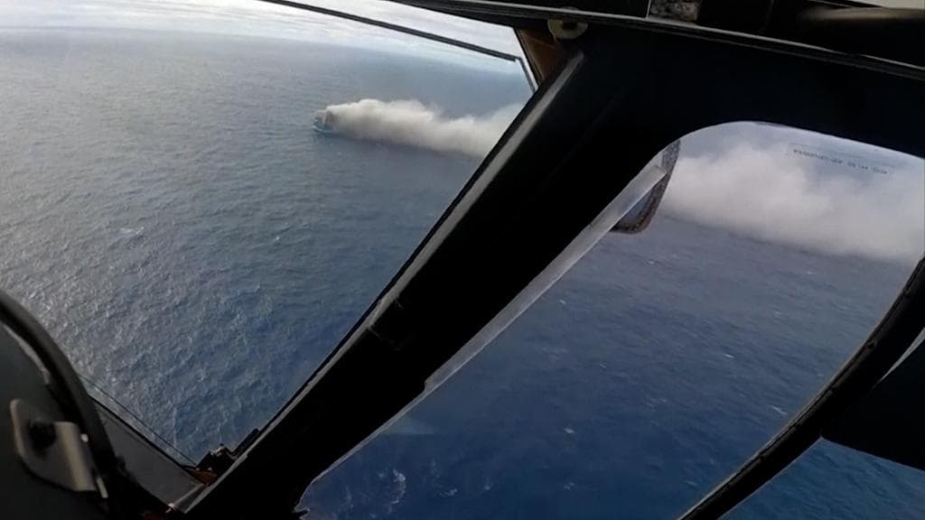 Cargo ship carrying thousands of Bentleys, Porsches & other luxury cars is on fire mid sea 