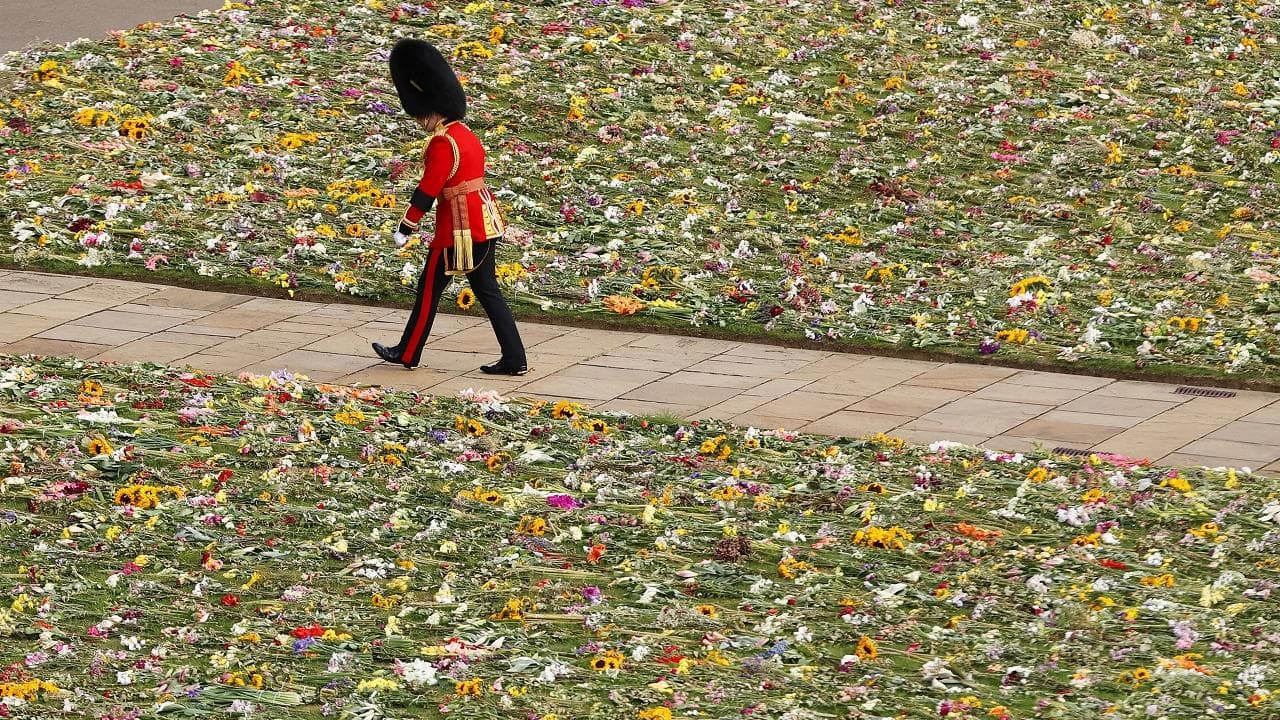 UK falls silent as church bells and hymns mark Queen's funeral