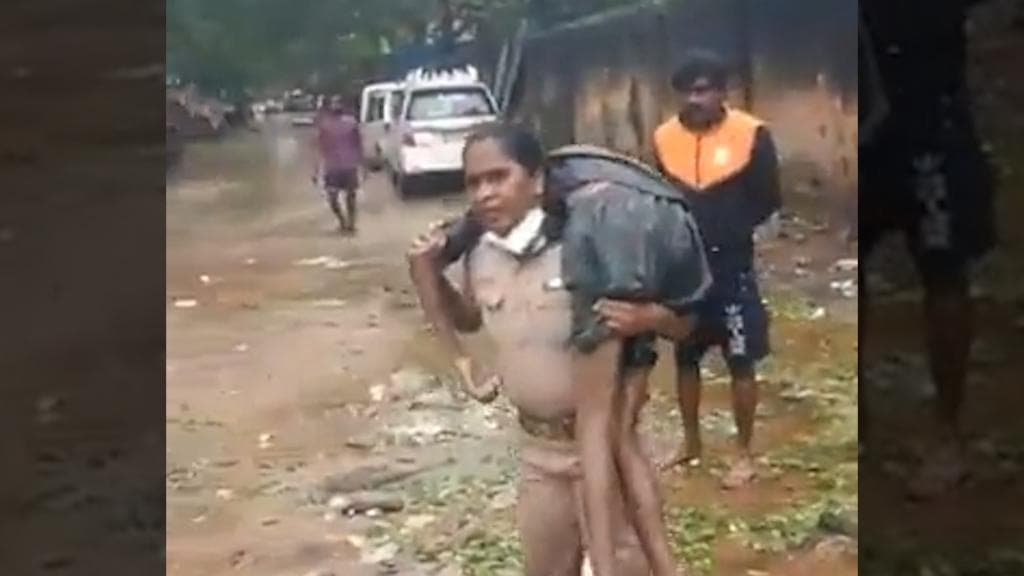 Chennai rains: woman police inspector carries unconscious man on her shoulders
