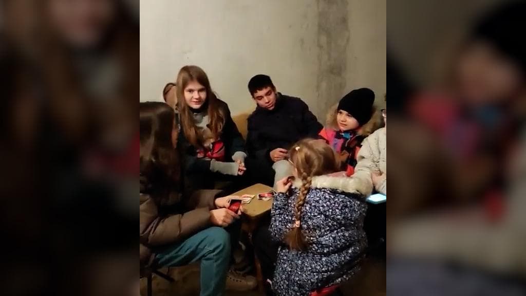 Ukraine: Kids sing anthem in bomb shelter; crowd attacks Russian army vehicle in Kharkiv in govt videos