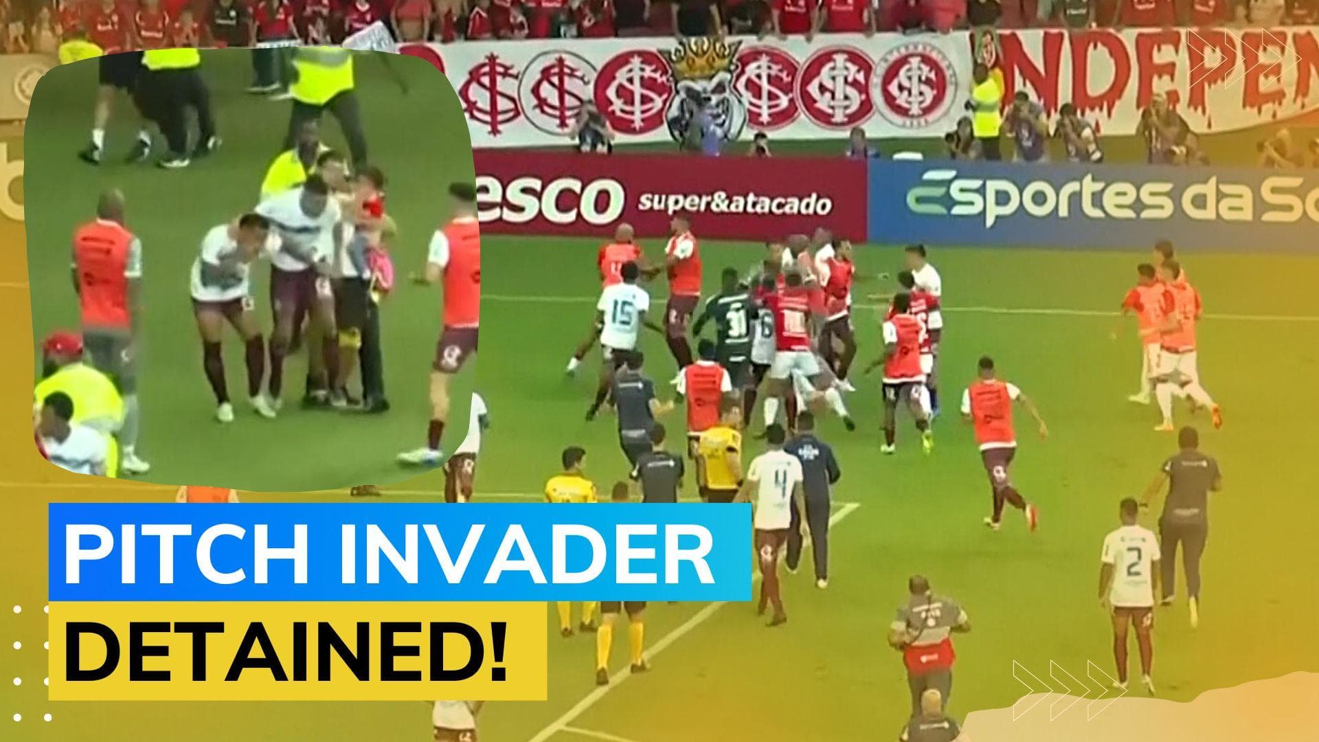 Watch! Fan attacks player while holding kid at football match in Brazil