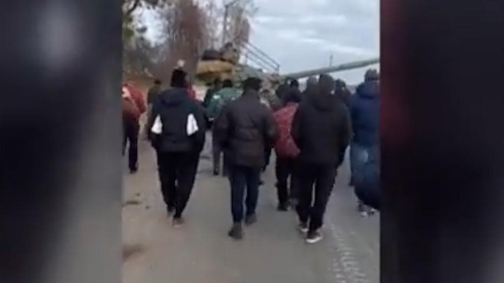 Watch: Ukrainians surround Russian tank to stop it from entering Kyiv