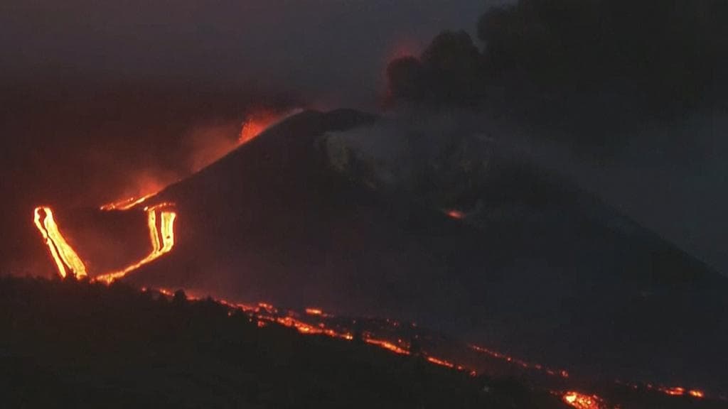Watch: Volcano lava lights up night sky on La Palma island