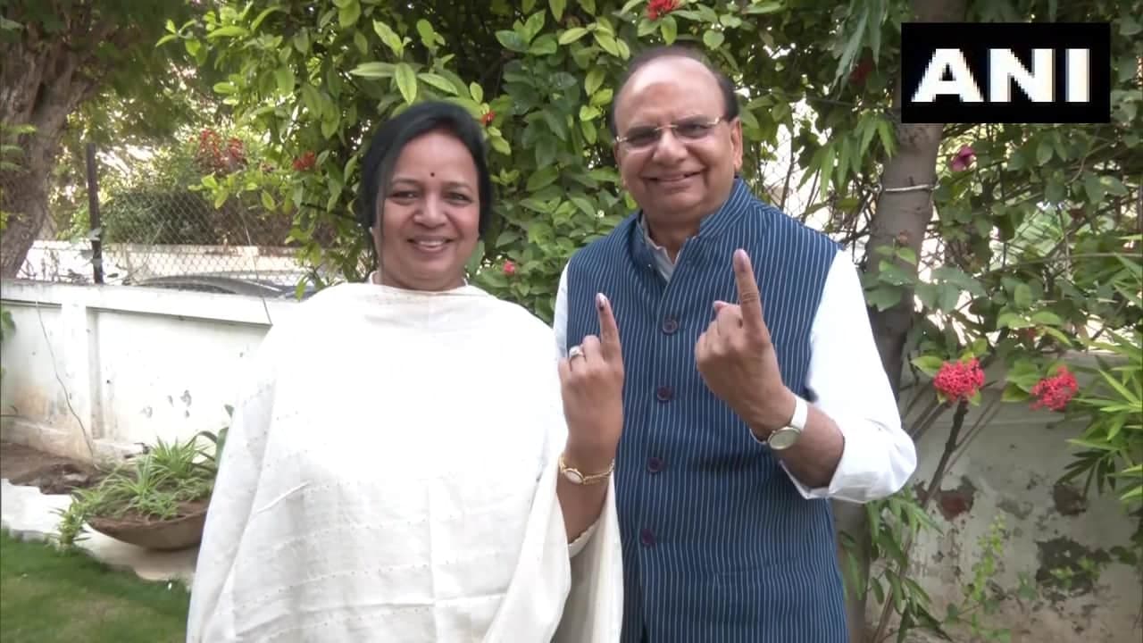 Gujarat Election 2022: Delhi LG, wife cast vote Gujarat Election 2022: Delhi LG, wife cast vote
